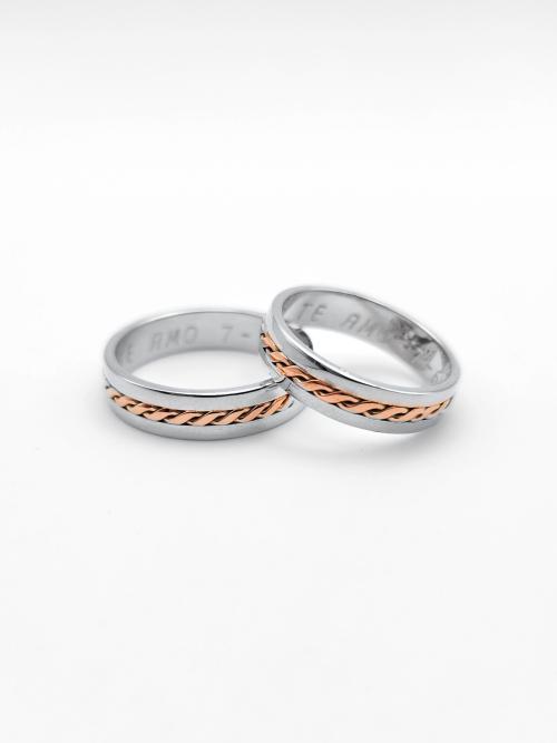 Par de alianzas en oro blanco 18K con trenza en oro rosa
