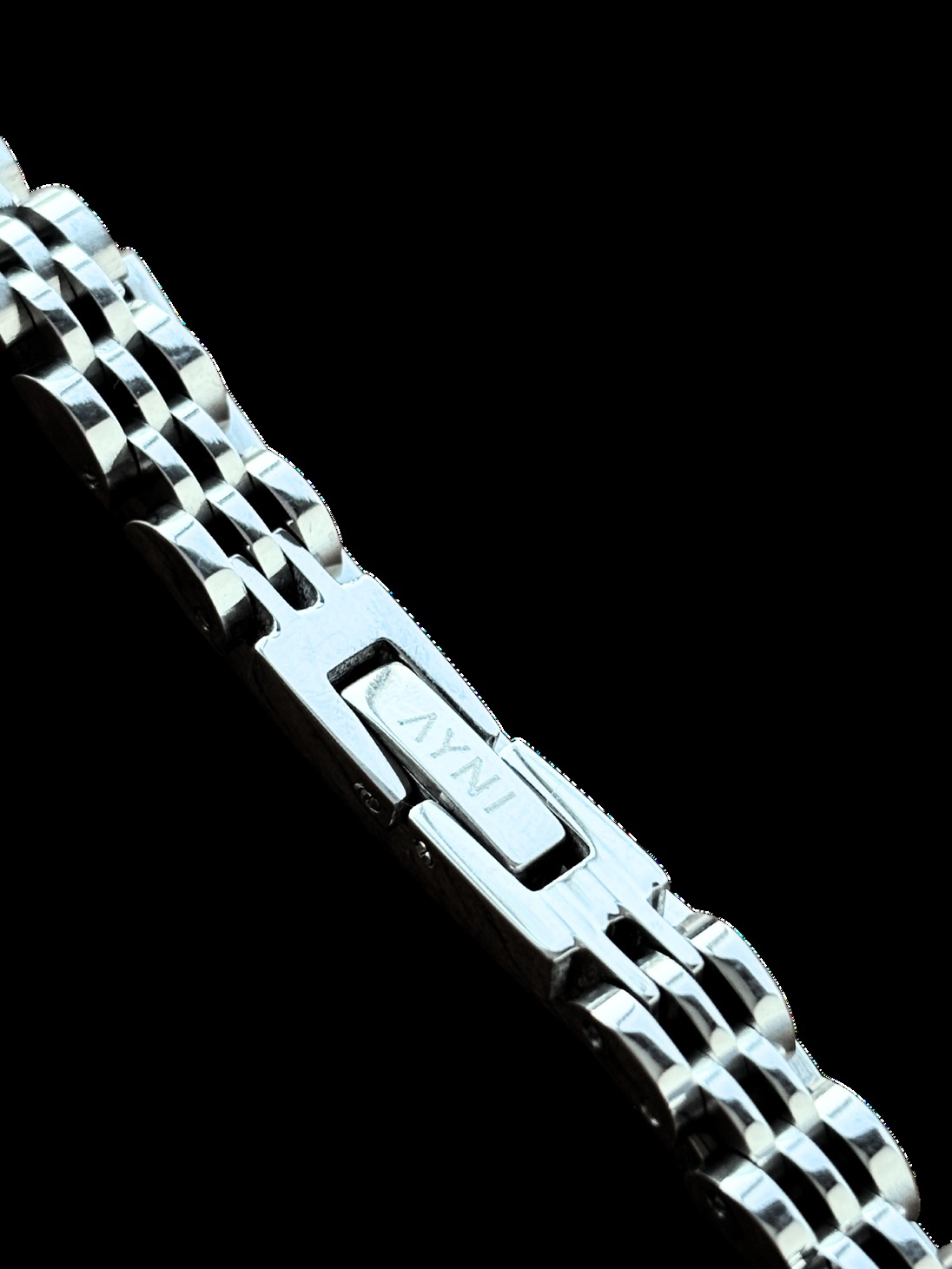Pulsera AYNI de acero con placa y eslabones articulados