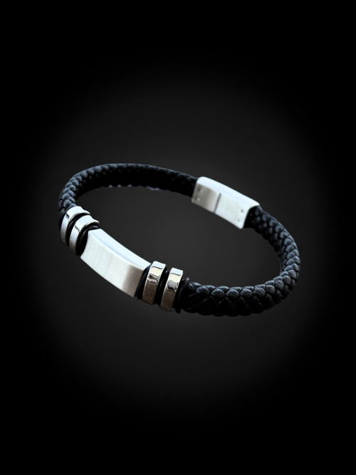 Pulsera AYNI de cuero trenzado y acero con placa y doble anillo